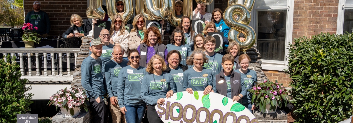 The Great Community Give celebrating their goals.