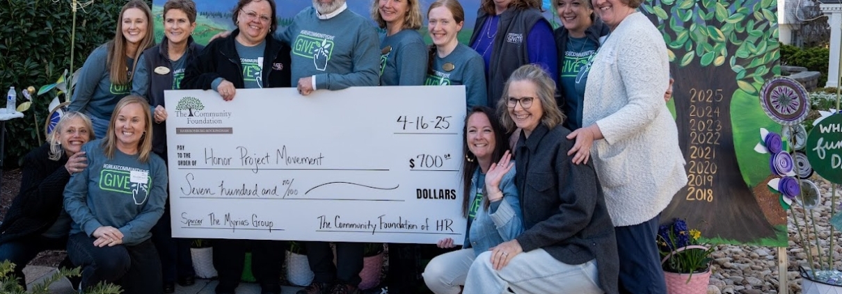 A photo of donation recipients at the Great Community Give