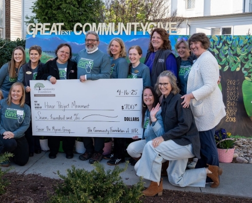 A photo of donation recipients at the Great Community Give